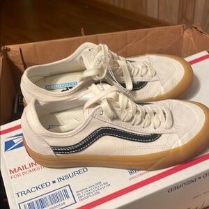 Vans White Sneakers with Black Stripe and Gum Sole